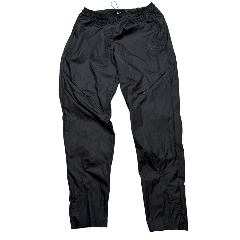 NIKE Running Division Pants Black Zippered Pockets‎ Women's Size Medium
